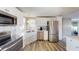 Modern kitchen with stainless steel appliances and sleek countertops at 218 Palm Air Dr, Osprey, FL 34229