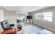 Comfortable living room with a large sliding glass door at 218 Palm Air Dr, Osprey, FL 34229