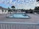 Enjoy the sunshine at the beautiful community pool, surrounded by plenty of lounge chairs at 218 Palm Air Dr, Osprey, FL 34229