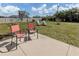 Backyard showcasing patio area, lawn space, and comfortable outdoor seating at 229 San Marco Dr, Venice, FL 34285