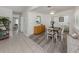 Dining room with seating for four, neutral colors, and views to other rooms at 229 San Marco Dr, Venice, FL 34285