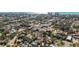 Real estate aerial view showcases a dense neighborhood near a serene ocean landscape at 236 Harbor S Dr # 202, Venice, FL 34285