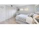 Serene bedroom with ample closet space, natural light, and a calming neutral color palette at 236 Harbor S Dr # 202, Venice, FL 34285
