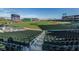 Expansive baseball field view from stadium seats, showcasing the green field and large video board at 268 Southampton Dr # 309, Venice, FL 34293