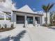 Stylish building with a welcoming entrance, complemented by well-maintained landscaping and a modern design at 268 Southampton Dr # 309, Venice, FL 34293