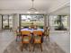 Bright dining room with a view of the water has an abundance of light and water views at 268 Southampton Dr # 309, Venice, FL 34293