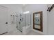 Modern bathroom with glass enclosed shower, and neutral decor at 29176 Coral Harbour Dr, Englewood, FL 34223