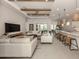 Bright and airy living area seamlessly connected to the kitchen and dining space at 29176 Coral Harbour Dr, Englewood, FL 34223