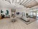 Bright and airy lobby with comfortable seating, modern lighting, and an open floor plan creates a welcoming space at 29176 Coral Harbour Dr, Englewood, FL 34223