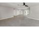 Spacious open living area leads to a kitchen and features modern lighting and tile flooring at 388 Flamingo Dr, Venice, FL 34285