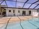 Screened-in pool and patio area, perfect for relaxing and entertaining outdoors at 388 Flamingo Dr, Venice, FL 34285
