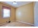 This bedroom is carpet free, and it comes with a window and ceiling fan at 4398 Summertree Rd, Venice, FL 34293