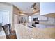 Well-equipped kitchen featuring granite countertops, modern appliances, and ample counter space, perfect for culinary enthusiasts at 4398 Summertree Rd, Venice, FL 34293