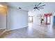 Open-concept living area with tile flooring and lots of natural light at 4398 Summertree Rd, Venice, FL 34293