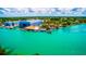 Aerial view of waterfront homes, boat docks and waterways near Tampa, Florida at 471 Bayshore Rd, Nokomis, FL 34275