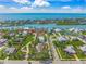 Aerial view of a beautiful waterfront neighborhood close to open water at 471 Bayshore Rd, Nokomis, FL 34275