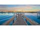 Scenic dock with views of beautiful water and skyline in the distance at 471 Bayshore Rd, Nokomis, FL 34275