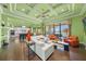 Bright living room with a view, modern furniture, and stylish coffered ceilings at 471 Bayshore Rd, Nokomis, FL 34275