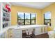 Bright office space with custom built-in desk, cabinets and water views at 471 Bayshore Rd, Nokomis, FL 34275
