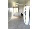 Sunroom offers ample space for relaxation, featuring built-in shelving and a ceiling fan at 495 Schooner St, North Port, FL 34287