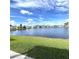 Scenic water view showcasing a tranquil lake surrounded by homes in a serene community at 495 Schooner St, North Port, FL 34287