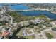 Waterfront community view with lush greenery, serene canal, and convenient city access at 501 Dona Dr, Nokomis, FL 34275
