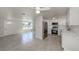 Open concept with stainless steel appliances and tile flooring at 501 Dona Dr, Nokomis, FL 34275
