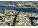 Aerial view with property lines marked on waterfront home along winding canals and a waterway at 506 Buena Vista Dr, Nokomis, FL 34275