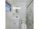 Well-lit bathroom featuring a modern vanity, sleek mirror, and a glass-enclosed shower, combining style and functionality at 506 Buena Vista Dr, Nokomis, FL 34275
