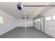 Spacious three-car garage with ample storage space and a clean, well-maintained interior, lots of possibilities at 506 Buena Vista Dr, Nokomis, FL 34275