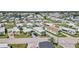 Aerial view of a mobile home community showcasing tidy streets and lush greenery at 508 Blackburn Blvd, North Port, FL 34287