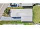 Top-down aerial view of a well-kept single-story home with a long driveway at 508 Blackburn Blvd, North Port, FL 34287