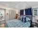 Bedroom with large bed, seahorse pillows and closet at 508 Blackburn Blvd, North Port, FL 34287