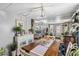 Dining room with laminate flooring, modern furnishings, and bright natural light at 508 Blackburn Blvd, North Port, FL 34287