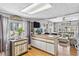 Kitchen with bright island, laminate floors, and an open floor plan at 508 Blackburn Blvd, North Port, FL 34287