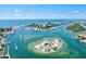 An aerial shot of a coastal community and several waterways popular for fishing and recreational boating at 632 Valencia Rd, Venice, FL 34285