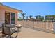 Charming balcony with comfortable seating and a fire pit, offering stunning views of the city skyline at 632 Valencia Rd, Venice, FL 34285
