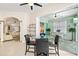 Breakfast nook with bar seating, view to Gathering room and outdoor seating at 632 Valencia Rd, Venice, FL 34285