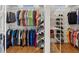 Large walk-in closet with custom shelving and hanging rods for optimal storage and organization at 632 Valencia Rd, Venice, FL 34285