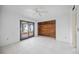 This open-concept bedroom has tile floors, a cedar closet, and a patio at 718 Golden Beach Blvd # 2, Venice, FL 34285