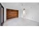 Bright bedroom with tiled floors and a cedar-lined walk-in closet at 718 Golden Beach Blvd # 2, Venice, FL 34285
