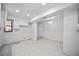 Bright kitchen space with white cabinets, tile flooring, and chandelier ready for customization at 718 Golden Beach Blvd # 2, Venice, FL 34285