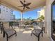 Relaxing balcony with comfortable seating and views of the pool and ocean at 830 The Esplanade N # 201, Venice, FL 34285