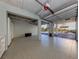 Spacious garage with epoxy flooring and ample storage space at 830 The Esplanade N # 201, Venice, FL 34285