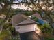 Charming home exterior showcasing a well-maintained lawn and a picturesque waterfront view at 832 Saintclair Cir # 832, Venice, FL 34285