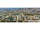 Aerial view of a vibrant residential area with well-maintained homes and picturesque ponds throughout the community at 8603 46Th Avenue W Cir, Bradenton, FL 34210