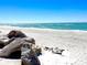 Beautiful beach with clear turquoise water and white sand, complemented by a blue sky on a sunny day at 8603 46Th Avenue W Cir, Bradenton, FL 34210