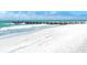 Sandy beach with gentle waves, a perfect spot for relaxation and enjoying the coastal breeze at 8603 46Th Avenue W Cir, Bradenton, FL 34210