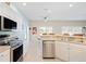 Kitchen featuring stainless steel appliances and white cabinets at 8603 46Th Avenue W Cir, Bradenton, FL 34210