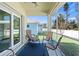 Inviting screened-in patio featuring comfortable seating and scenic views of the backyard at 8603 46Th Avenue W Cir, Bradenton, FL 34210